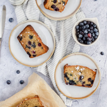 3 slices of Blueberry Banana Bread on plates
