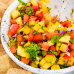 close up image of mango salsa completely diced and thoroughly combined together