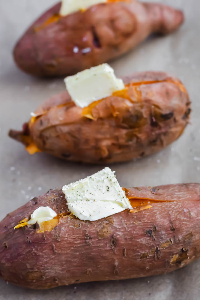 three sweet potatoes after boiling and before going into the oven