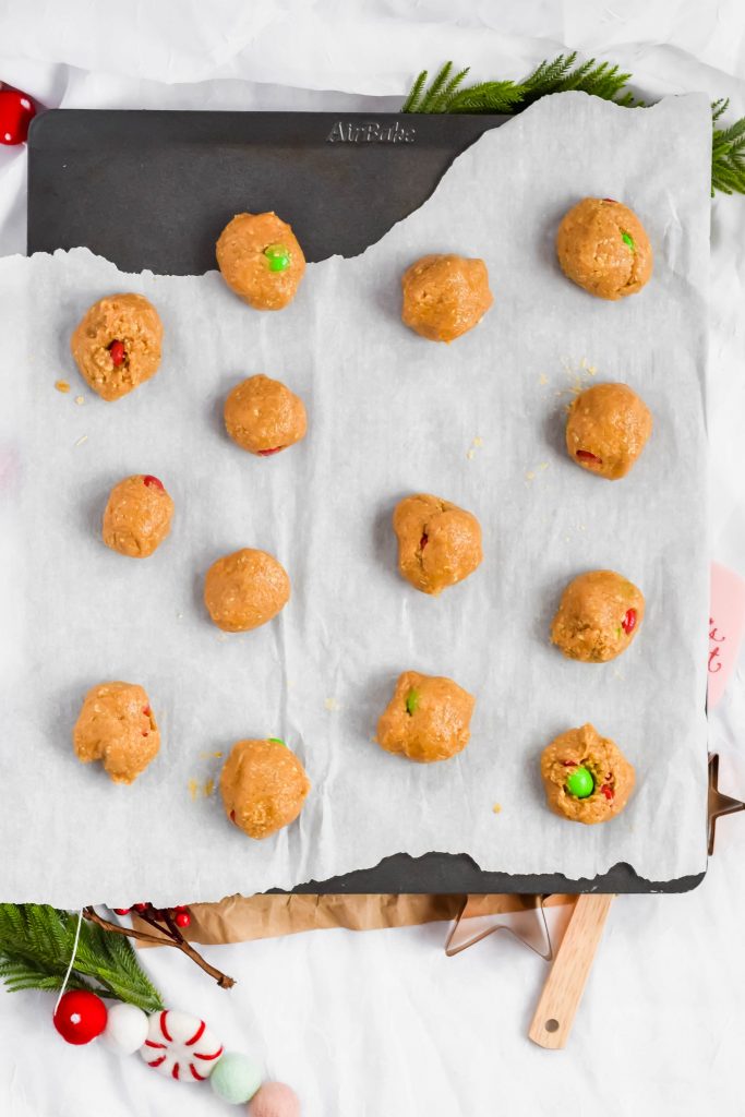 roll into cookie dough balls and place on a baking sheet