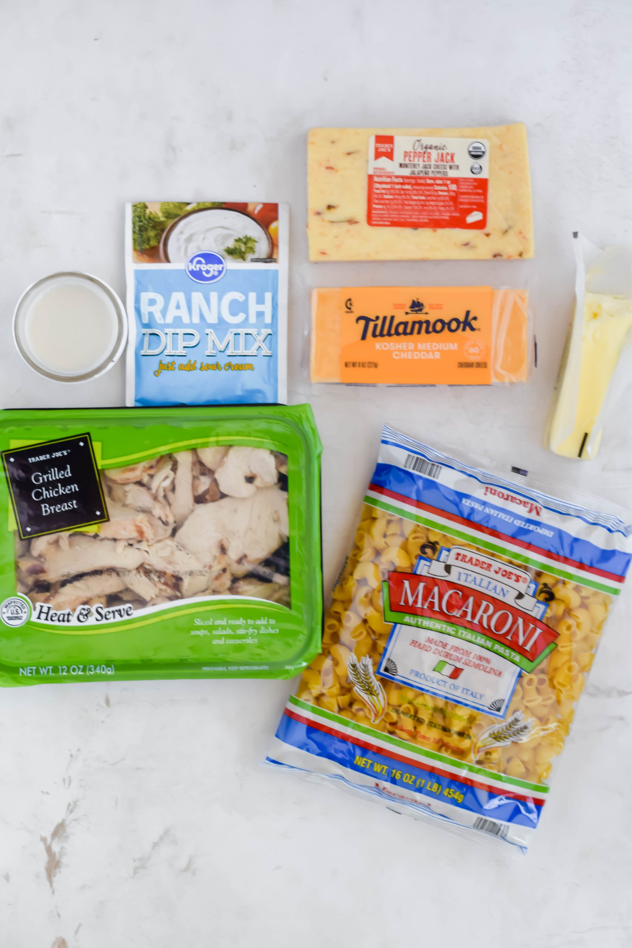flat lay of all ingredients needed for chicken ranch mac and cheese