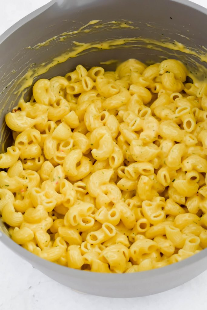 dutch oven filled with cheese macaroni 