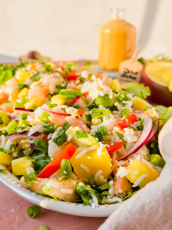 shrimp and mango salad on oval serving plate.