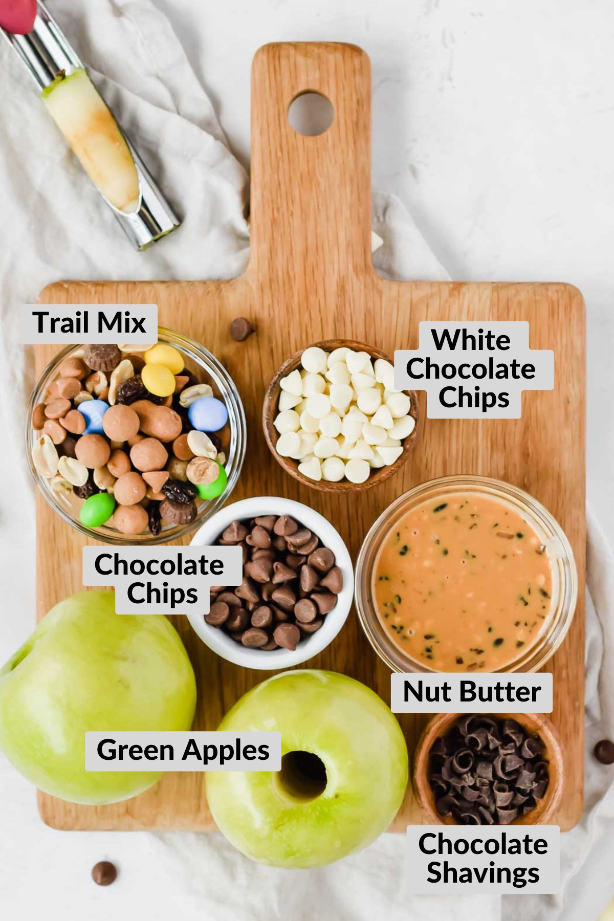 wooden tray with the ingredients needed for this recipe displayed in small bowls.