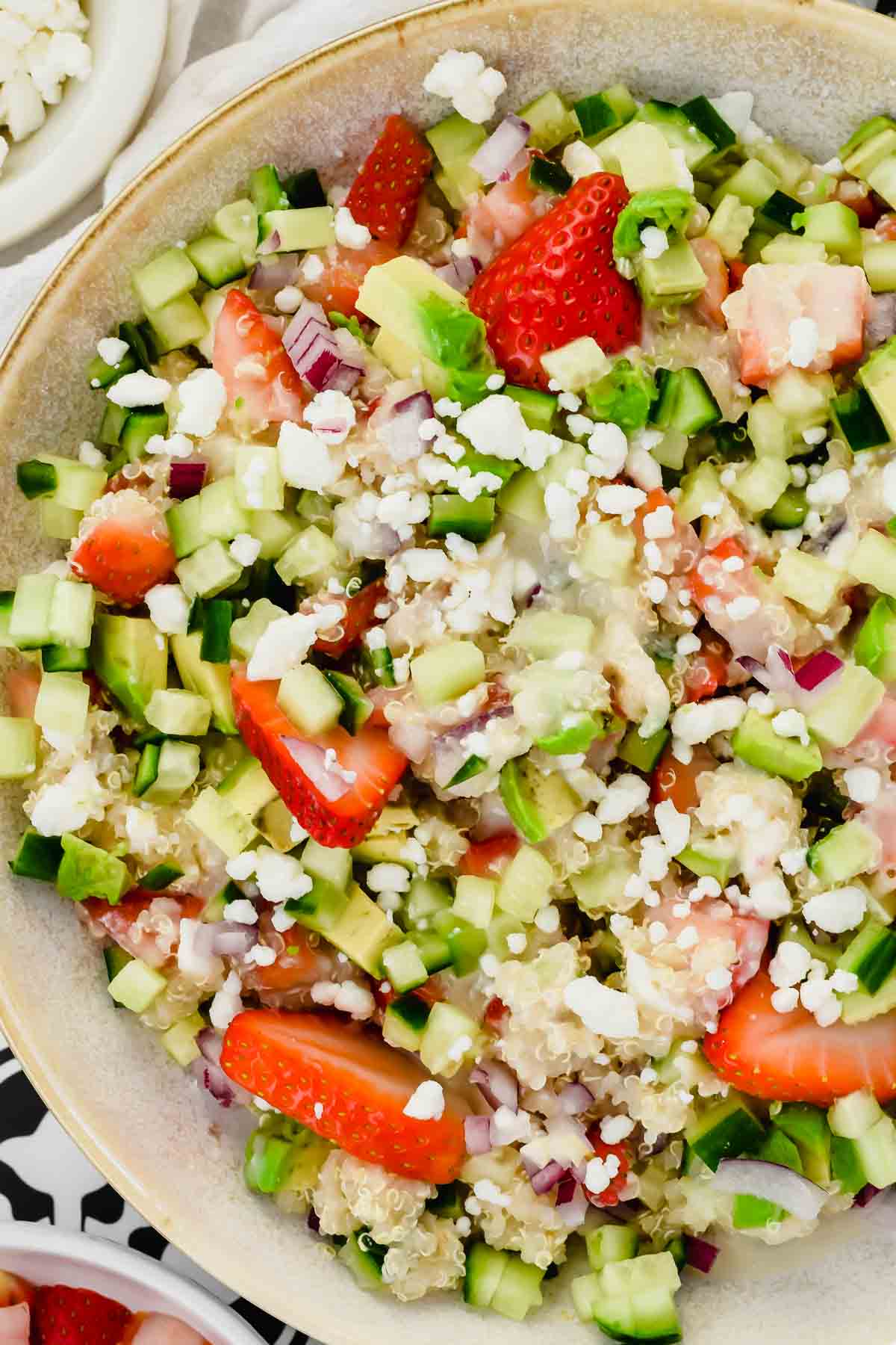 big salad bowl filled with Strawberry Quinoa Salad.