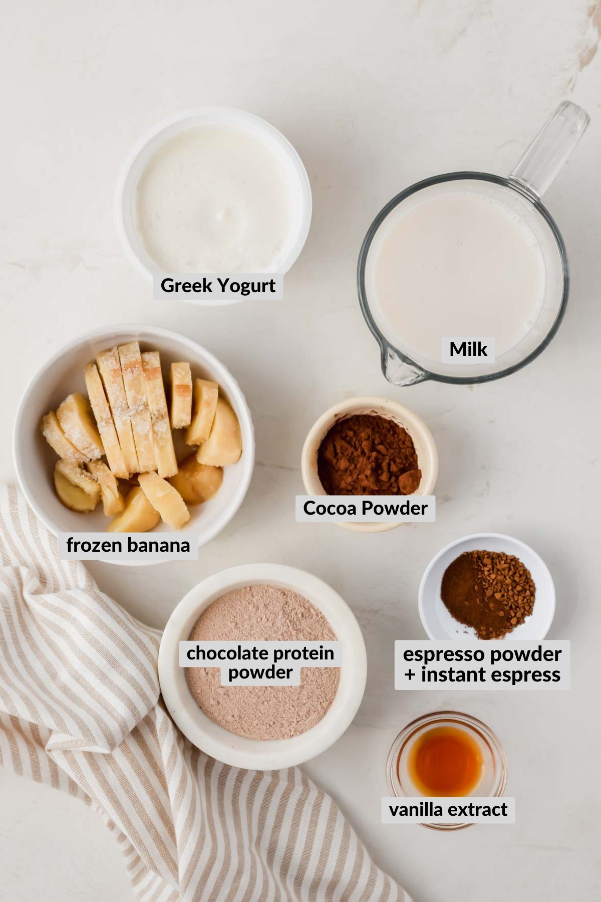 homemade tropical smoothie mocha madness smoothie ingredients in individual bowls.