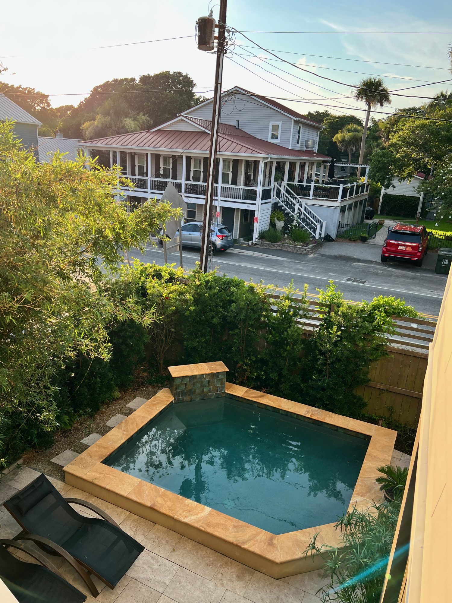 square pool in Airbnb backyard overlooking downtown Folly Beach, South Carolina. 