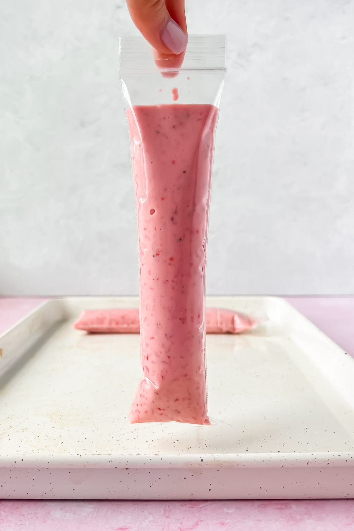 strawberry yogurt in plastic tube.