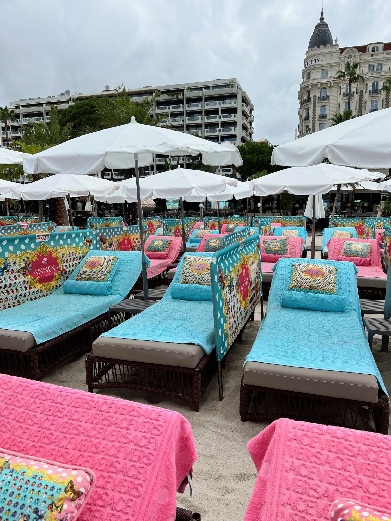 beach lounge chairs at the Annex Beach Club in Cannes, France.