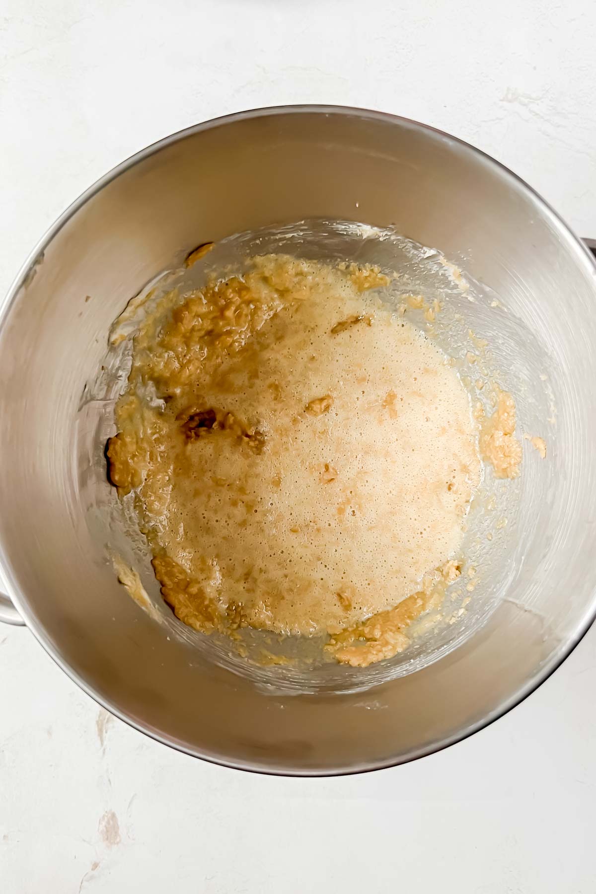 butter and brown sugar creamed together in mixing bowl.
