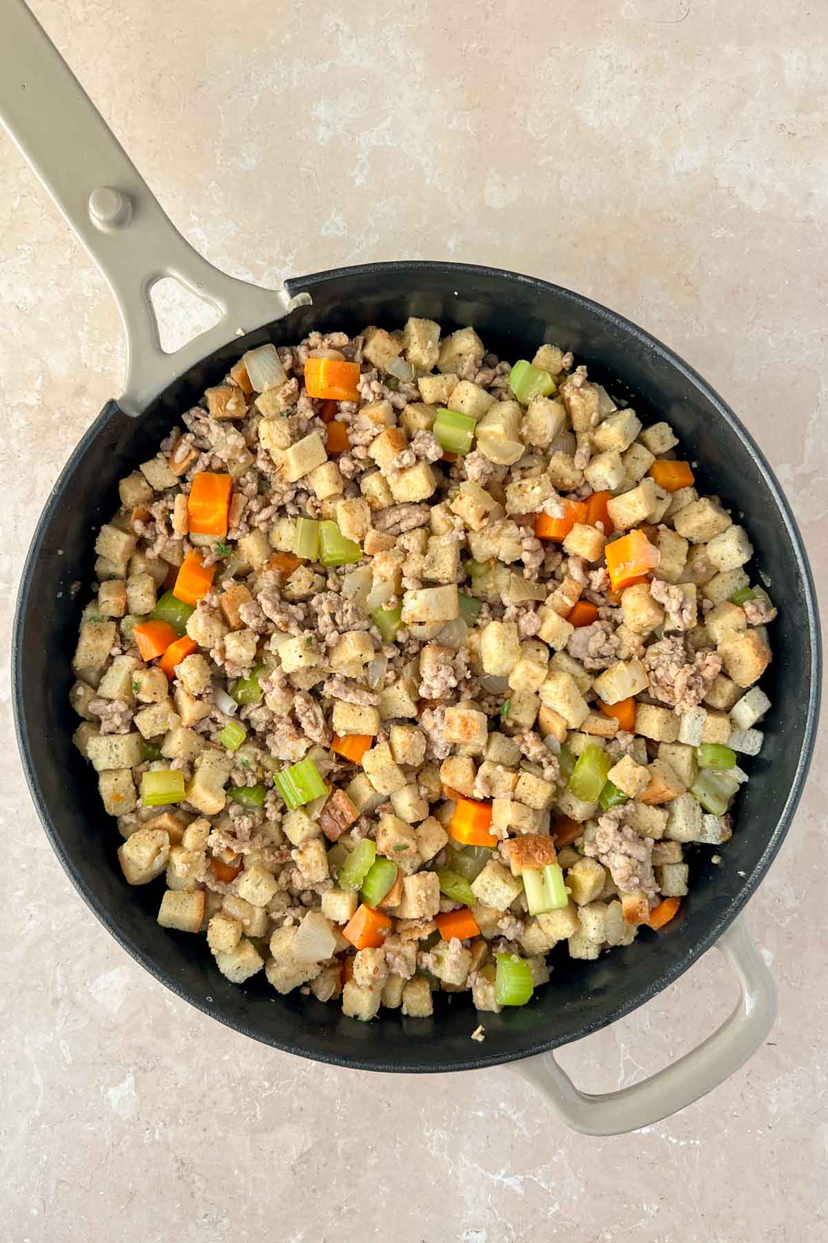 stove top stuffing with sausage in skillet.