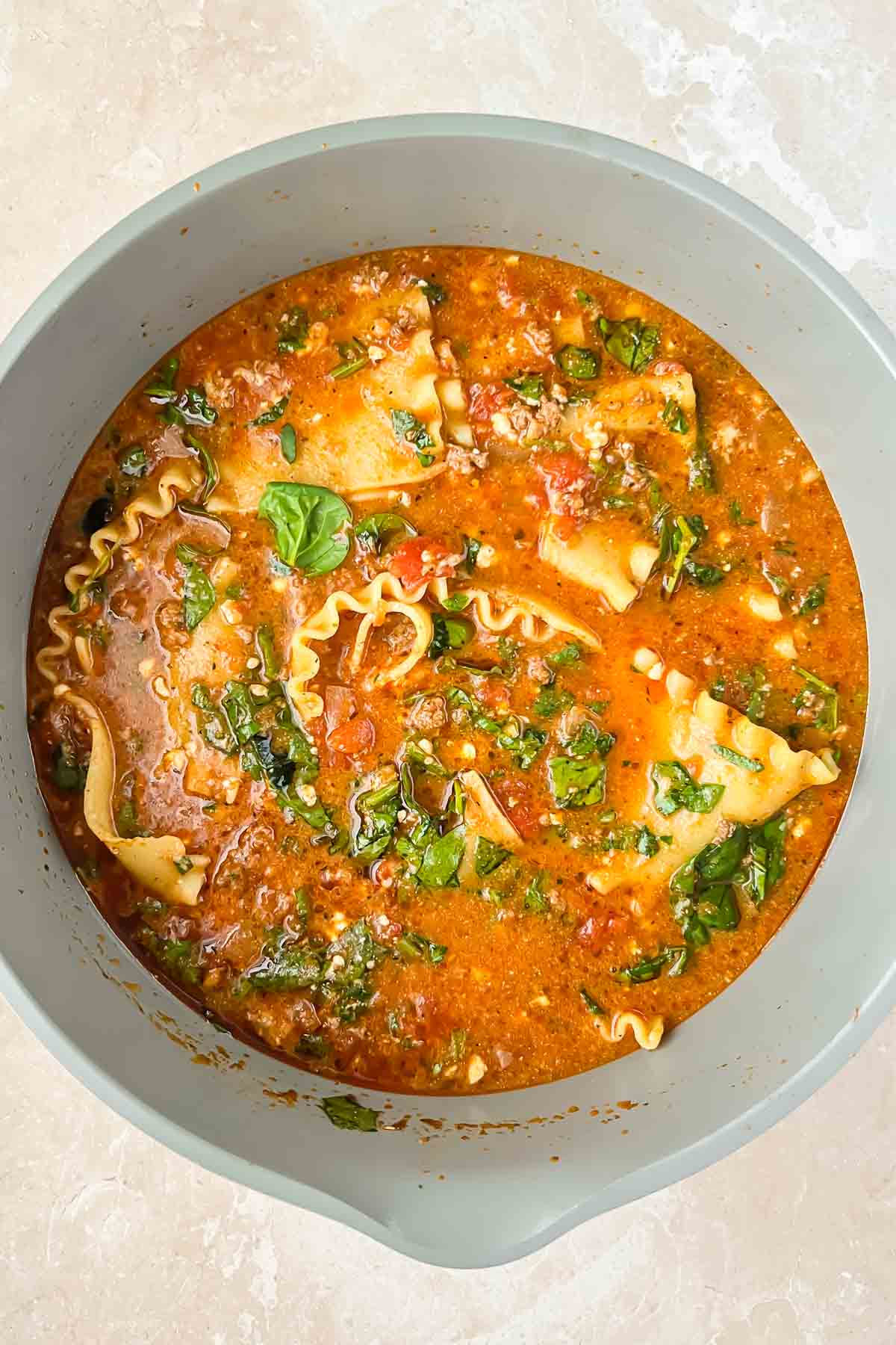 lasagna soup in gray soup pot.