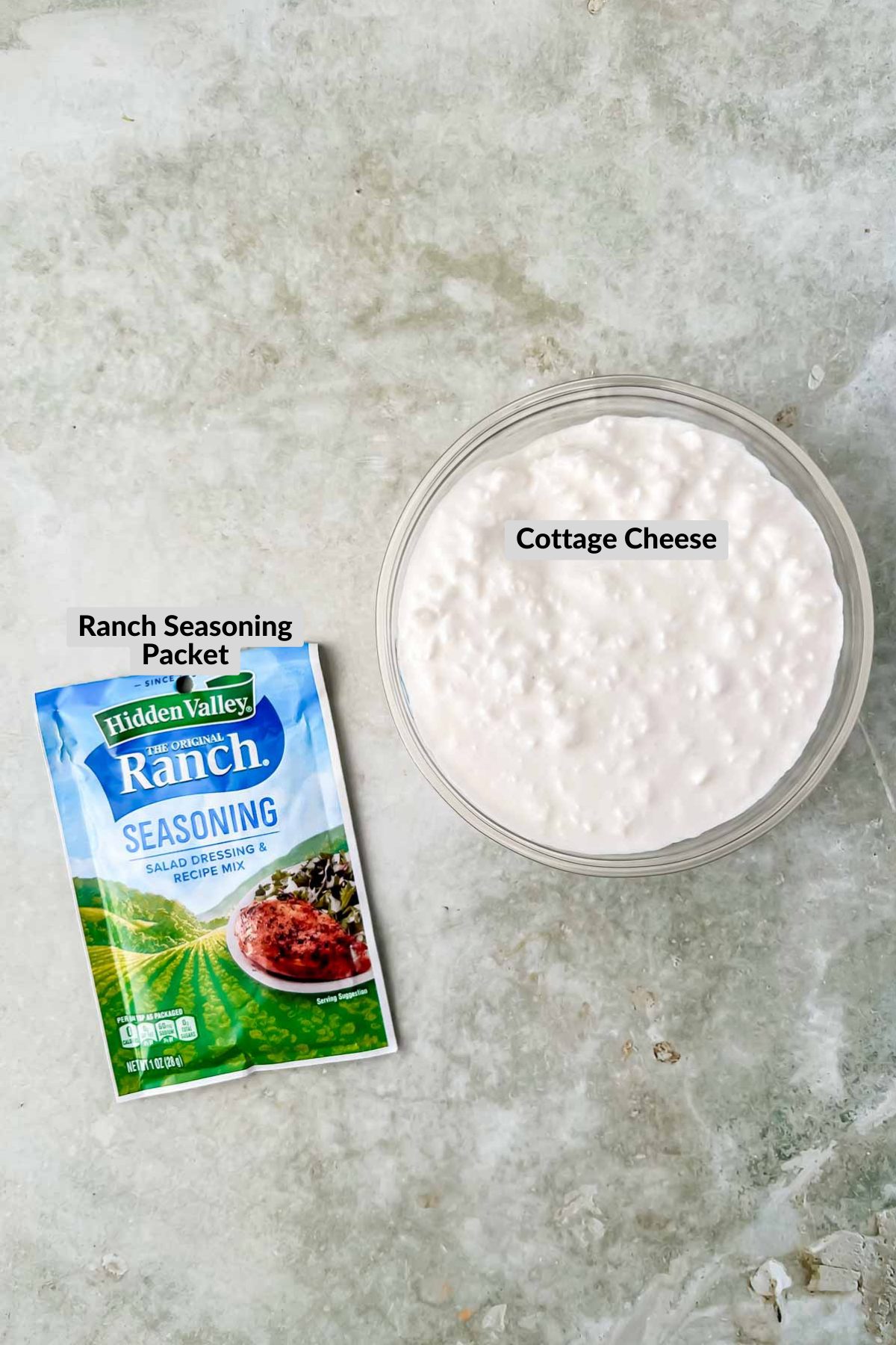 cottage cheese in bowl and ranch seasoning packet.