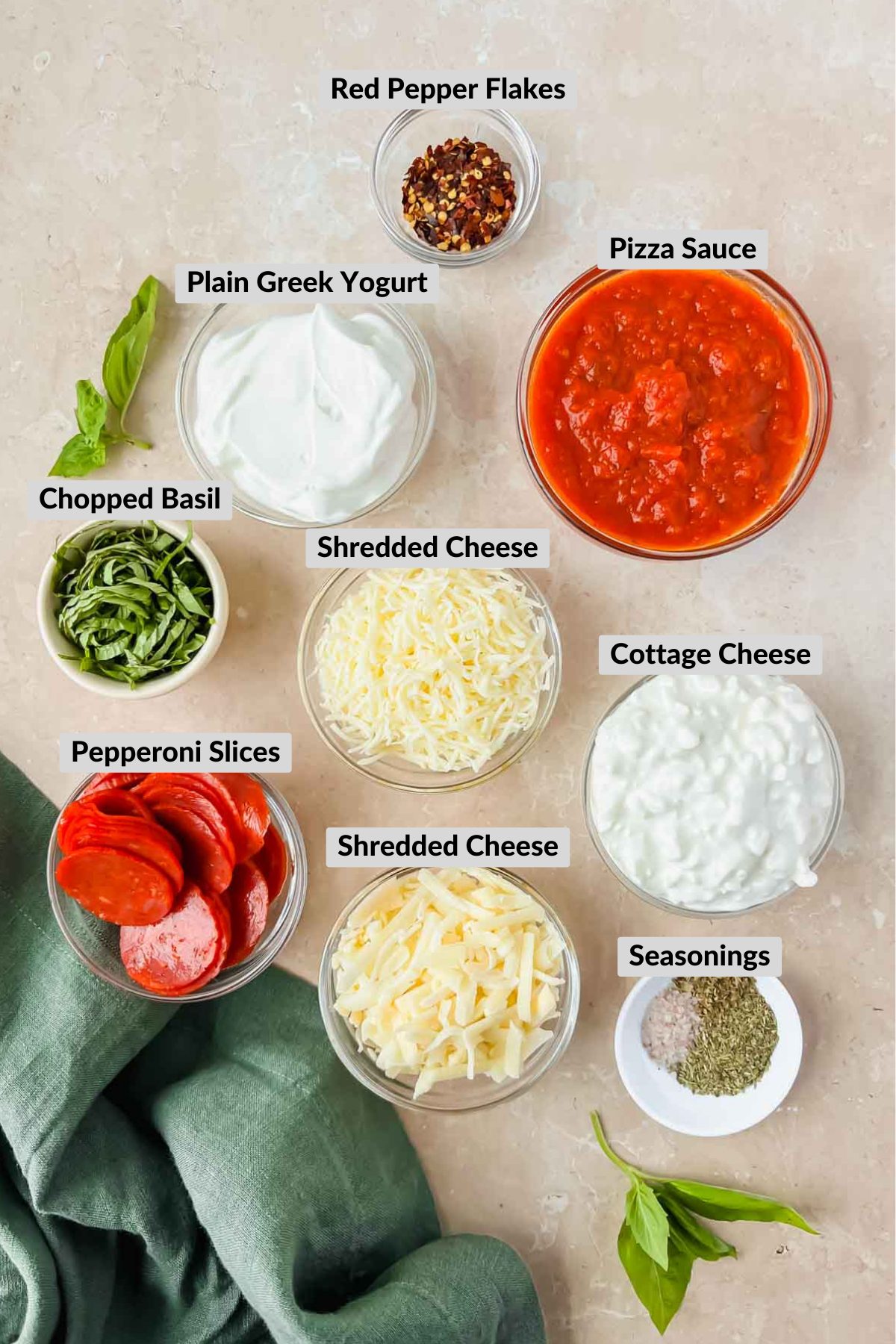 labeled ingredients for pepperoni pizza dip.