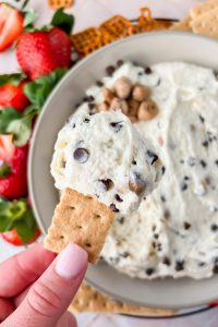 graham cracker dipped into cottage cheese cookie dough dip.