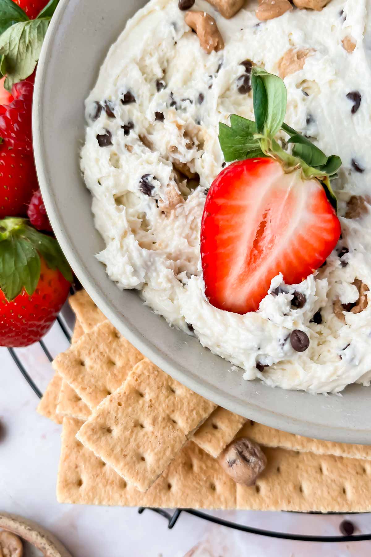 strawberry dipped into cottage cheese cookie dough dip.
