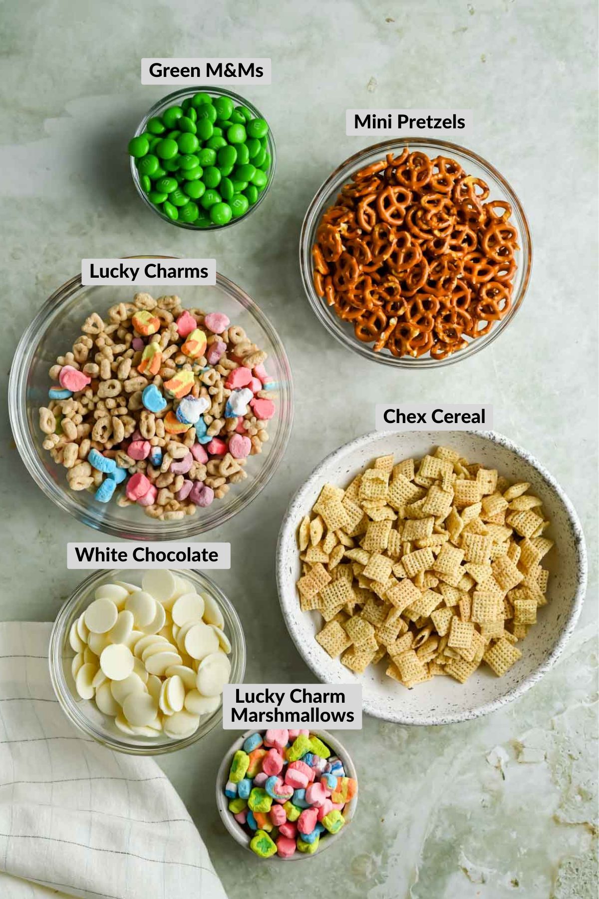 labeled ingredients for leprechaun bait in individual bowls.