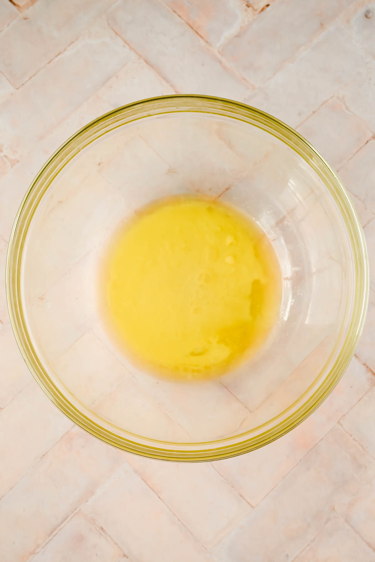 melted butter in glass mixing bowl.
