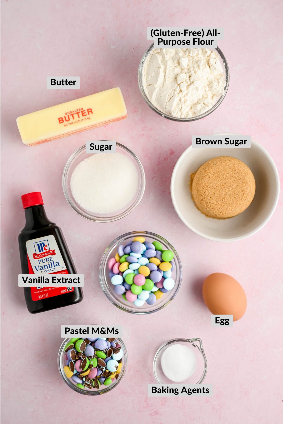 ingredients for easter M&M cookies in individual bowls.