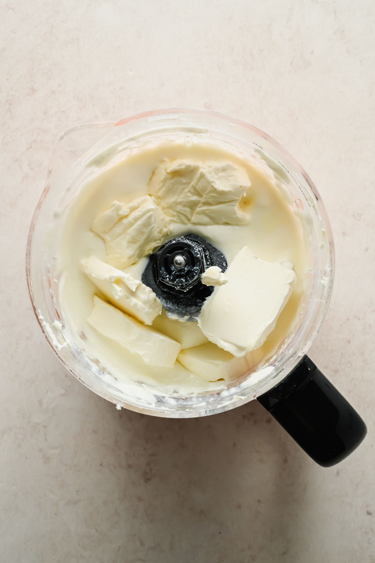 cream cheese and cottage cheese in food processor.