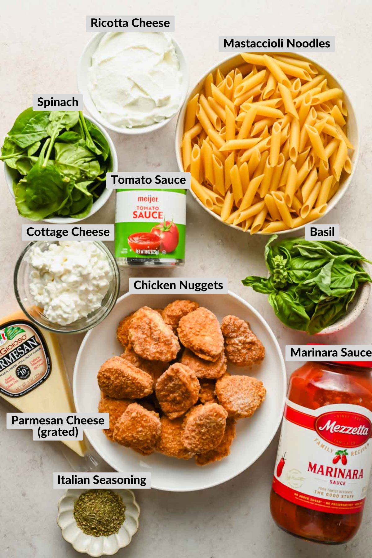labeled ingredients for healthier chicken parm bake in individual bowl.