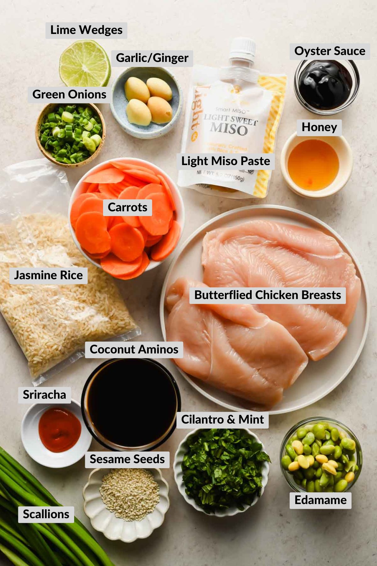 labeled ingredients for miso chicken in individual bowls.