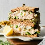 Matthew McConaughey Tuna Salad sandwich cut in half and two halves stacked on eachother.