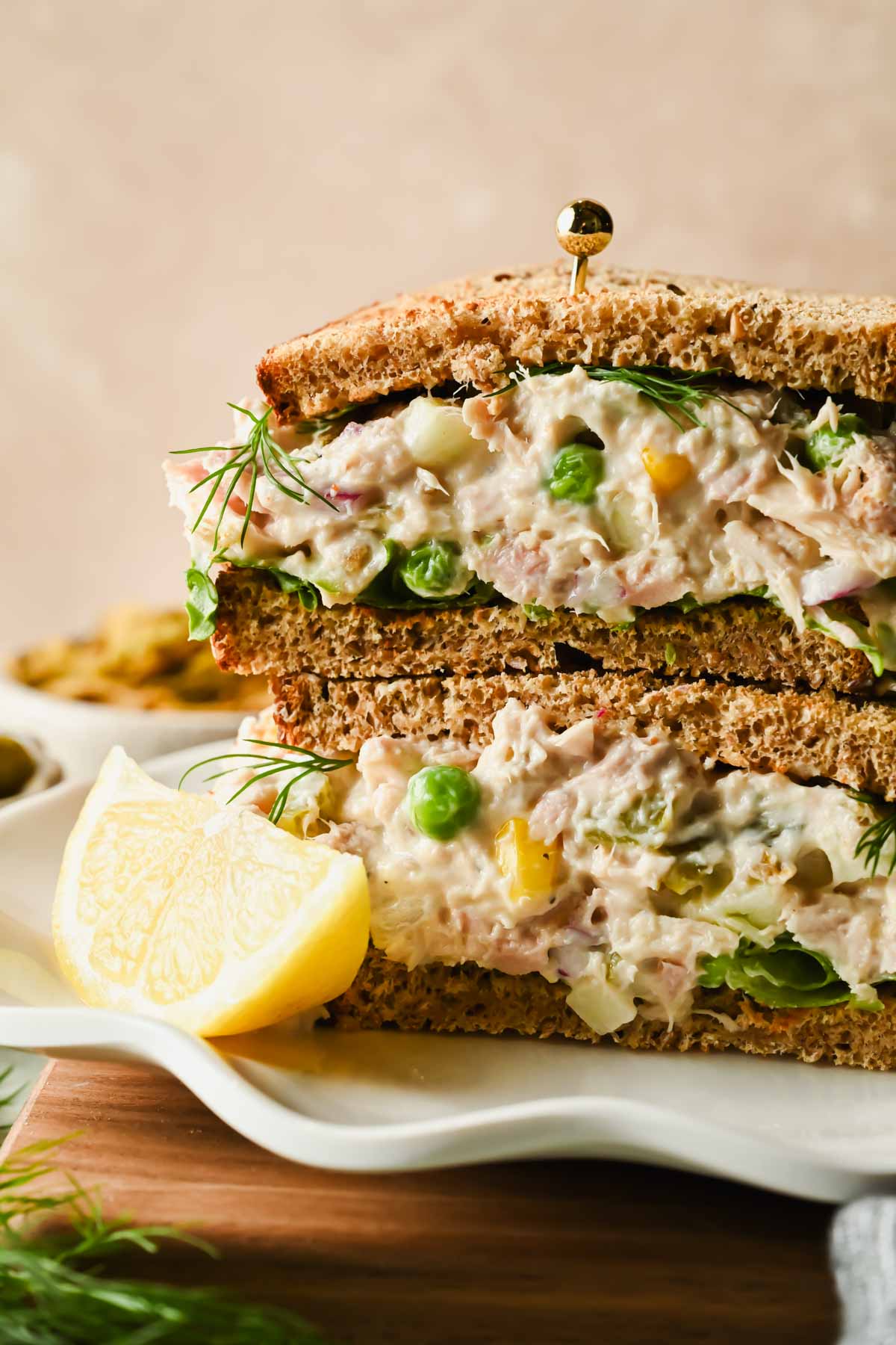 Matthew McConaughey Tuna Salad sandwich cut in half and two halves stacked on eachother.