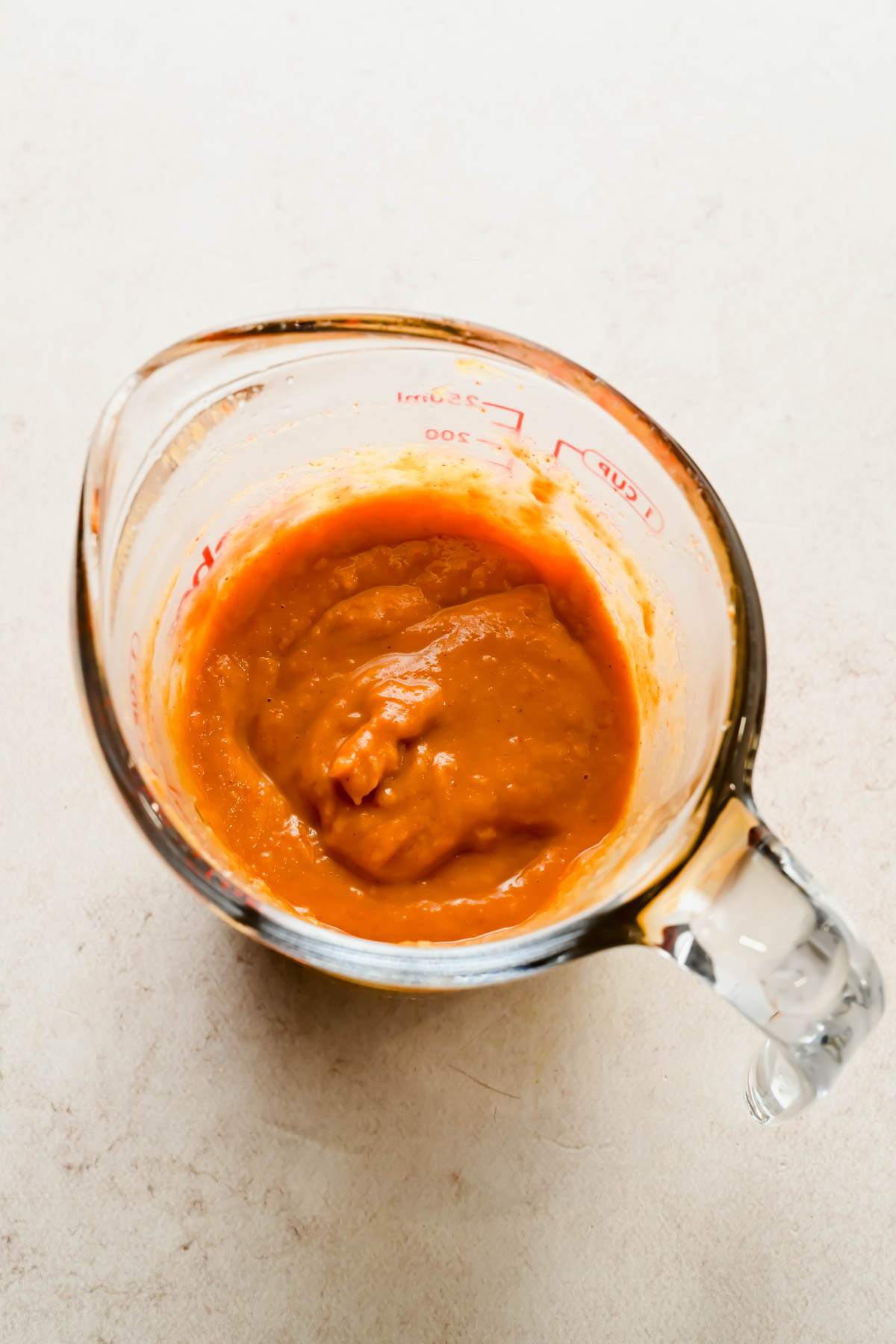 peanut ginger sauce mixed in large measuring cup.