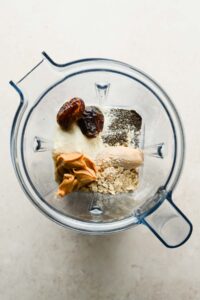 wild blueberry smoothie ingredients added to large blender.