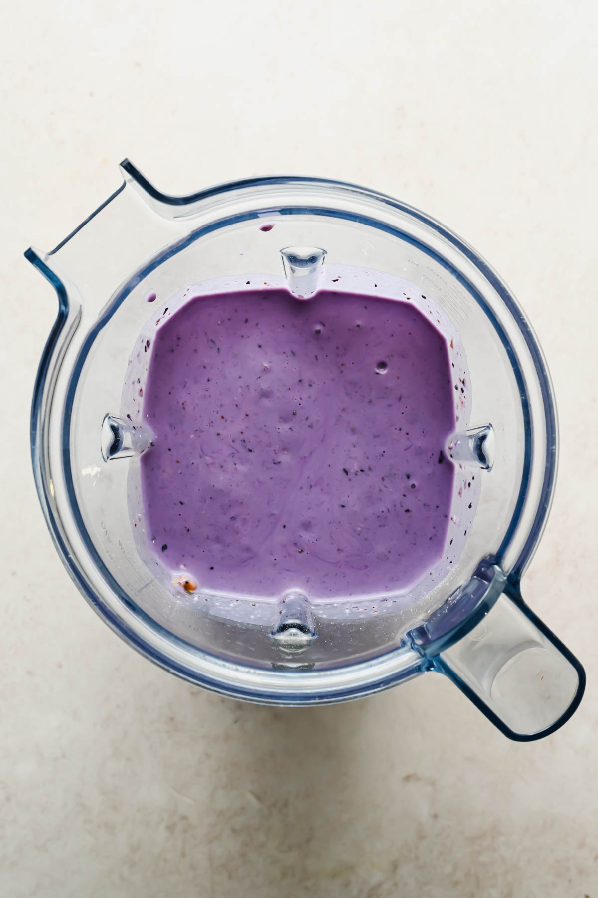 wild blueberry smoothie blended in large blender.