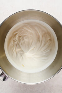 heavy whipping cream whipped in bowl of stand mixer.