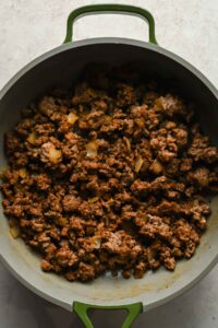ground beef and onions cooked in large skilet.